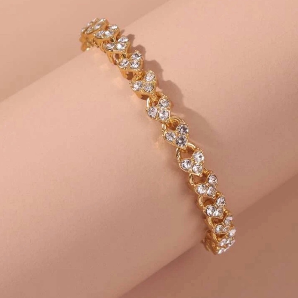Heart link yellow gold bracelet